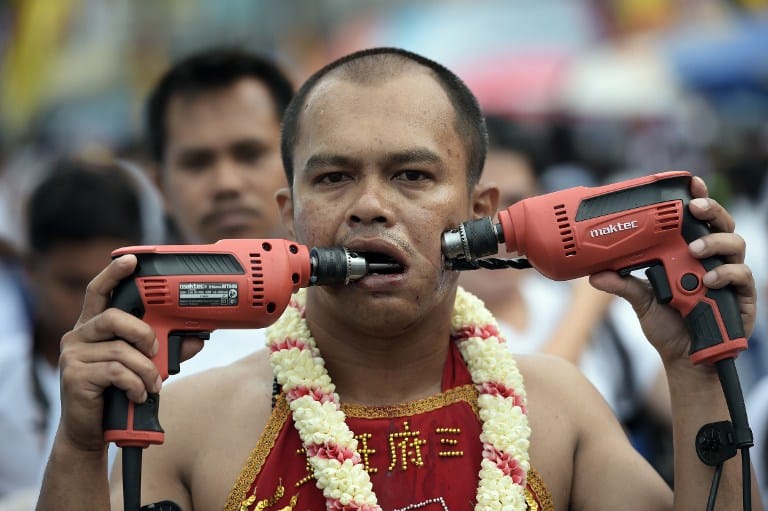 Pain and purity: Body modification grows more extreme at Phuket ...