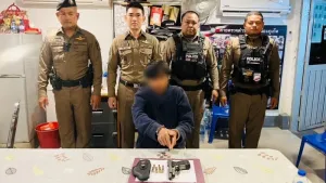 Teen arrested in Phuket checkpoint with modified gun and 11