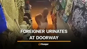 Foreign woman relieves herself at Phuket beachwear shop doorway | Thaiger