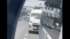 Phuket van criticised after following ambulance through red light