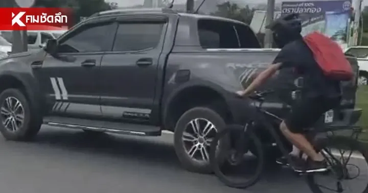 Cyclist filmed holding onto pickup truck on Phuket’s Thepkrasattri Road