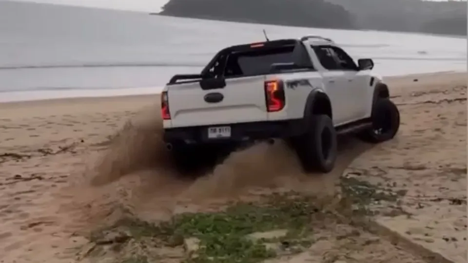 White Ford pickup seen driving on Phuket’s Bang Tao Beach